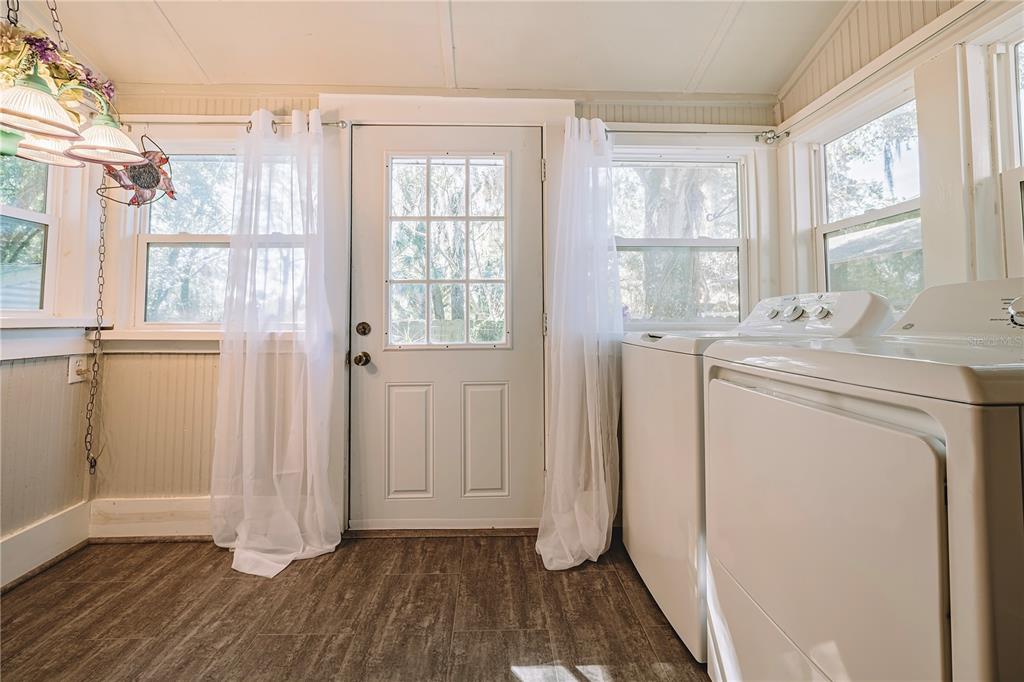 510 East Key Avenue Eustis, FL 32726 - Photo 26 of 40 a view of utility room with washer and dryer