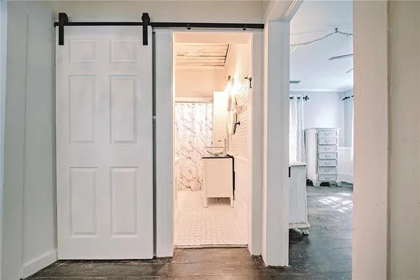 a view of a bathroom with a glass door