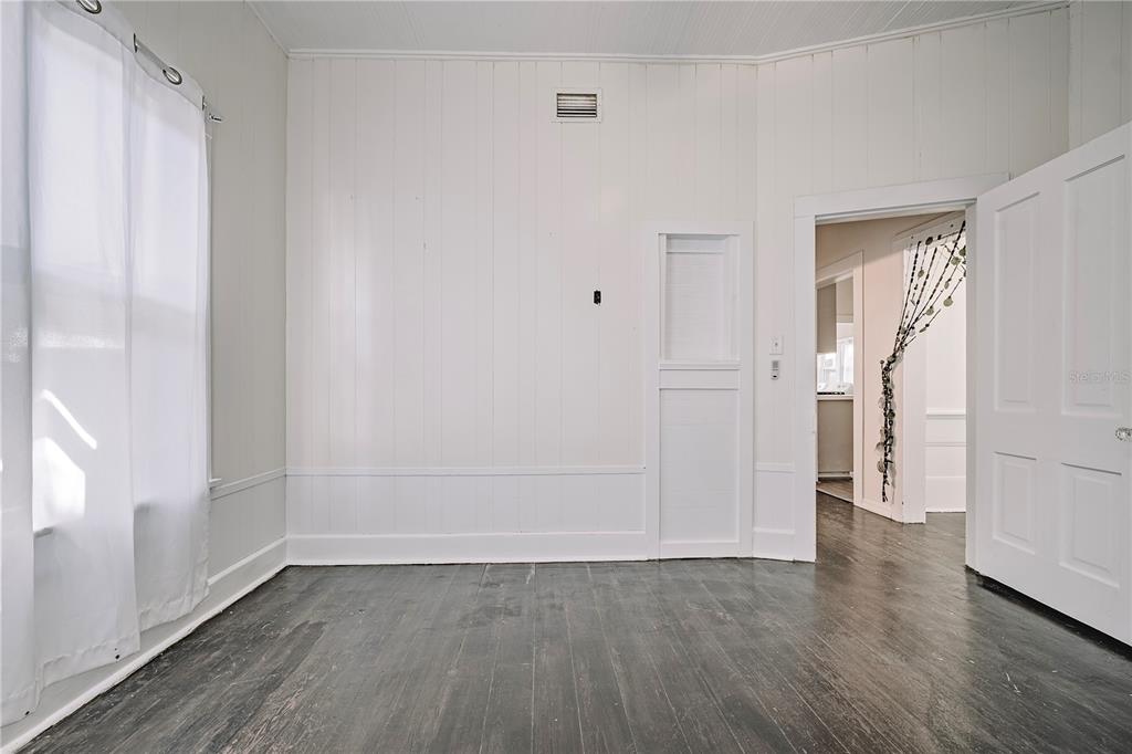 510 East Key Avenue Eustis, FL 32726 - Photo 34 of 40 a view of an empty room with wooden floor