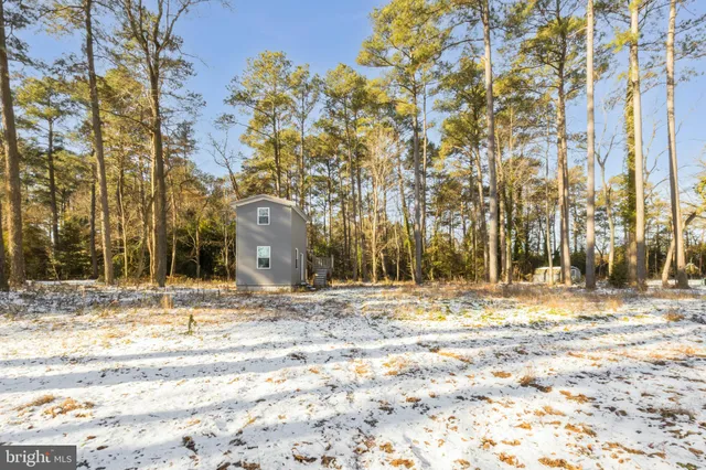 a view of a backyard of a house