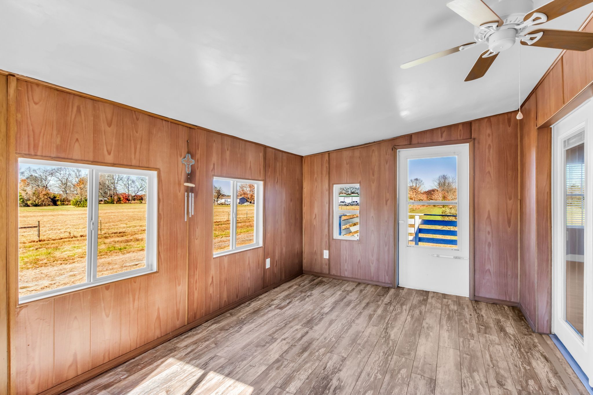 2190 Unionville Deason Road Bell Buckle, TN 37020 - Photo 13 of 33 a view of an empty room with a window and wooden floor