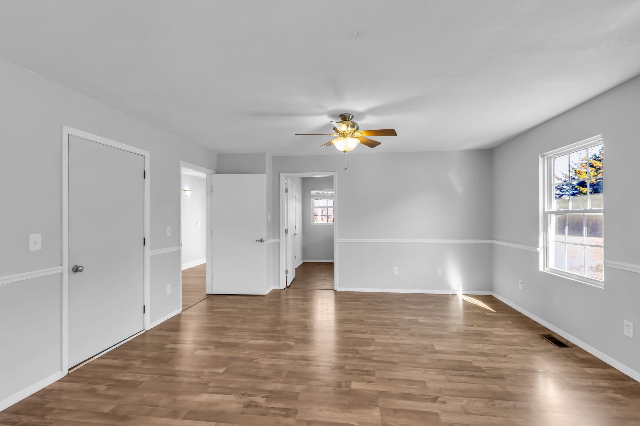 2190 Unionville Deason Road Bell Buckle, TN 37020 - Photo 14 of 33 wooden floor in an empty room with a window
