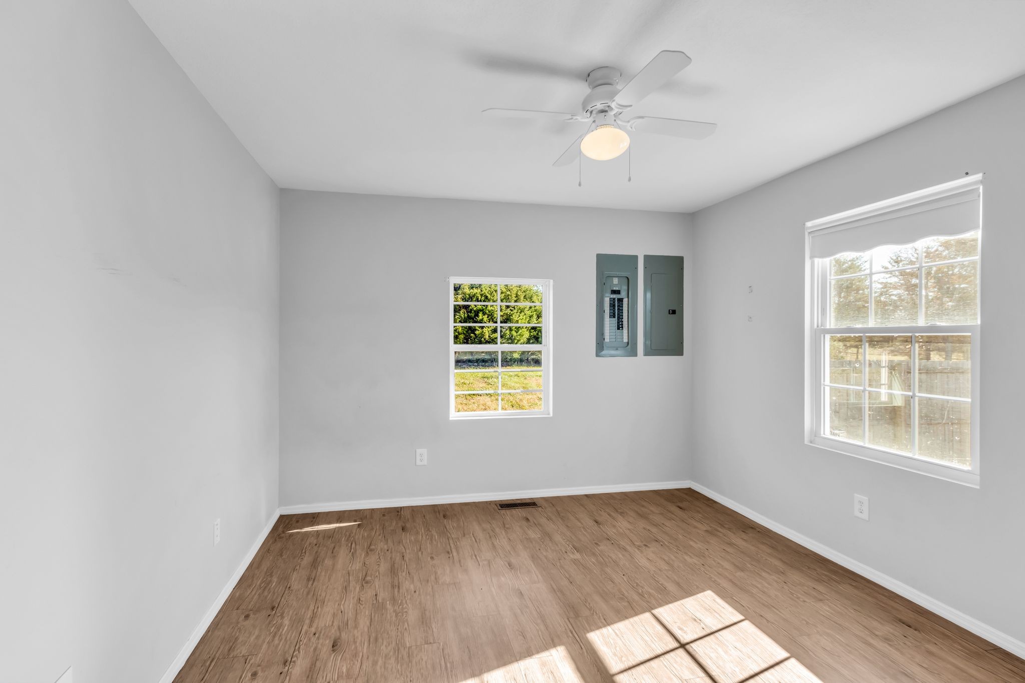2190 Unionville Deason Road Bell Buckle, TN 37020 - Photo 23 of 33 a view of an empty room with a window and wooden floor