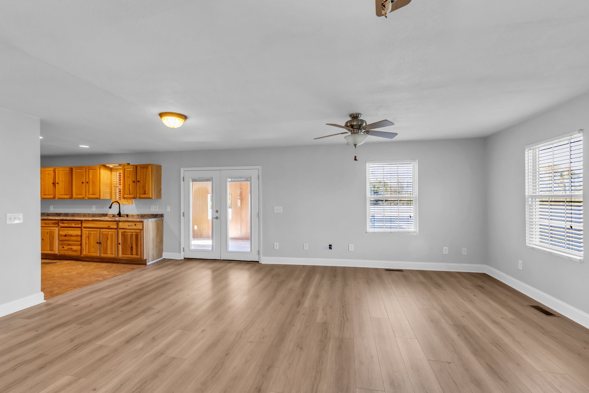 2190 Unionville Deason Road Bell Buckle, TN 37020 - Photo 8 of 33 wooden floor in an empty room with a window