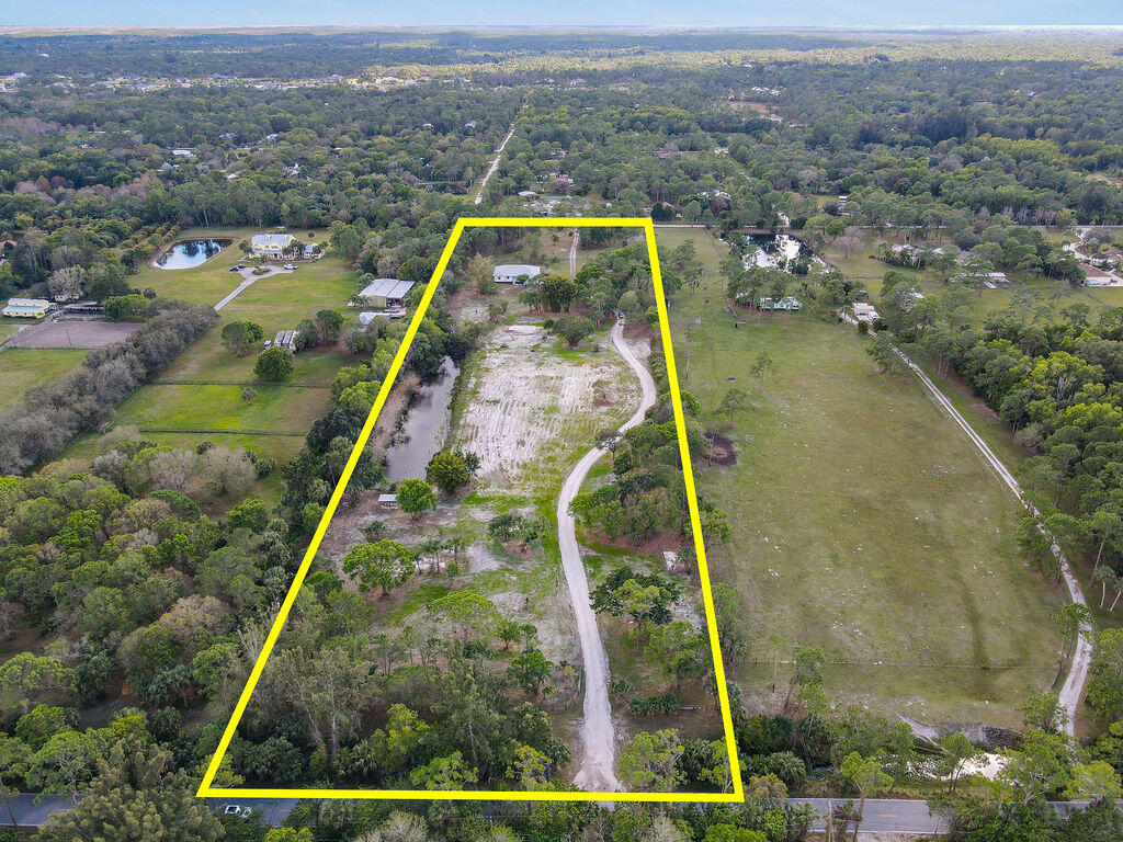 10792 Randolph Siding Road Jupiter, FL 33478 - Photo 12 of 55 an aerial view of residential houses with outdoor space