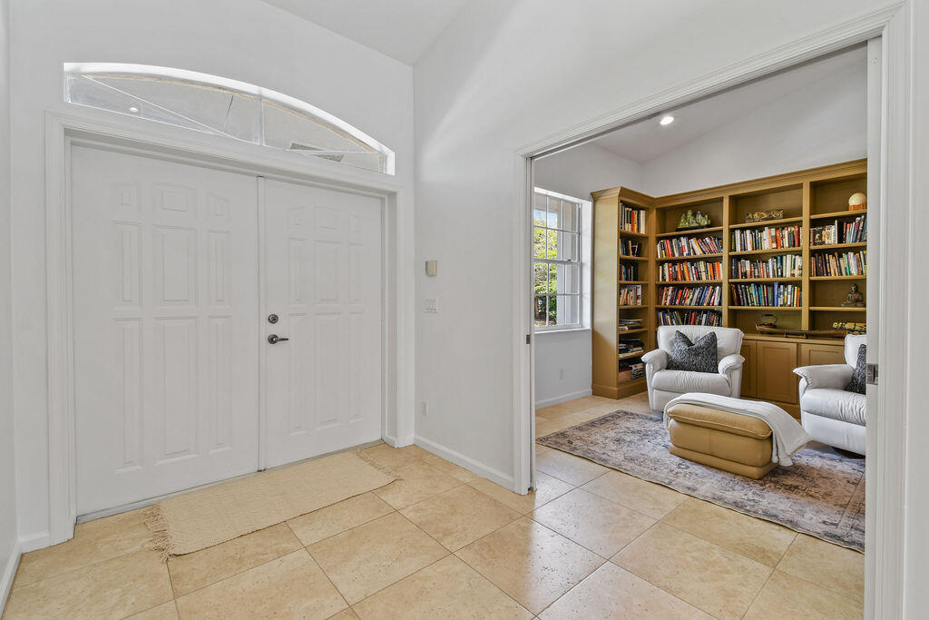 10792 Randolph Siding Road Jupiter, FL 33478 - Photo 28 of 55 a living room with furniture and a window