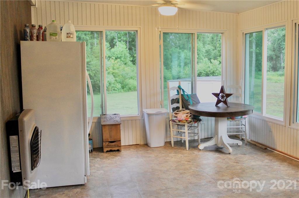 199 Robertson Road Rutherfordton, NC 28139 - Photo 13 of 13 a dining room with furniture and a window