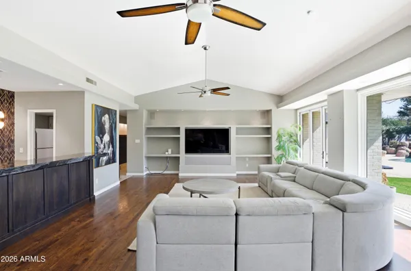 a living room with a couch and a flat screen tv