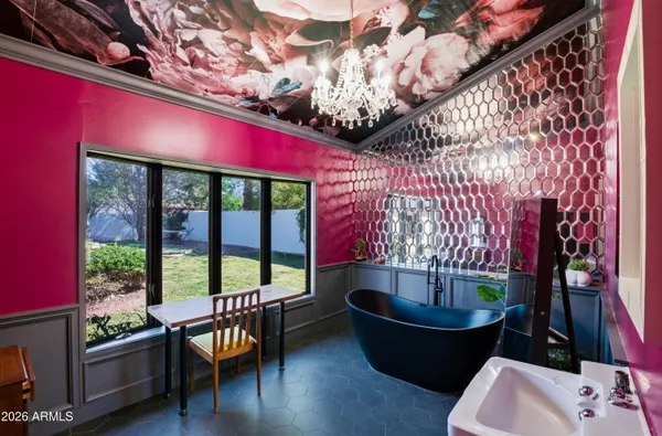 a room with furniture and flat screen tv