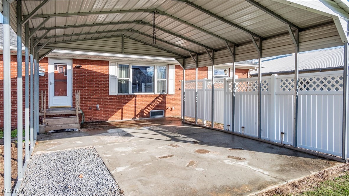 1950 Newark Road Zanesville, OH 43701 - Photo 29 of 39 View of patio / terrace featuring a carport