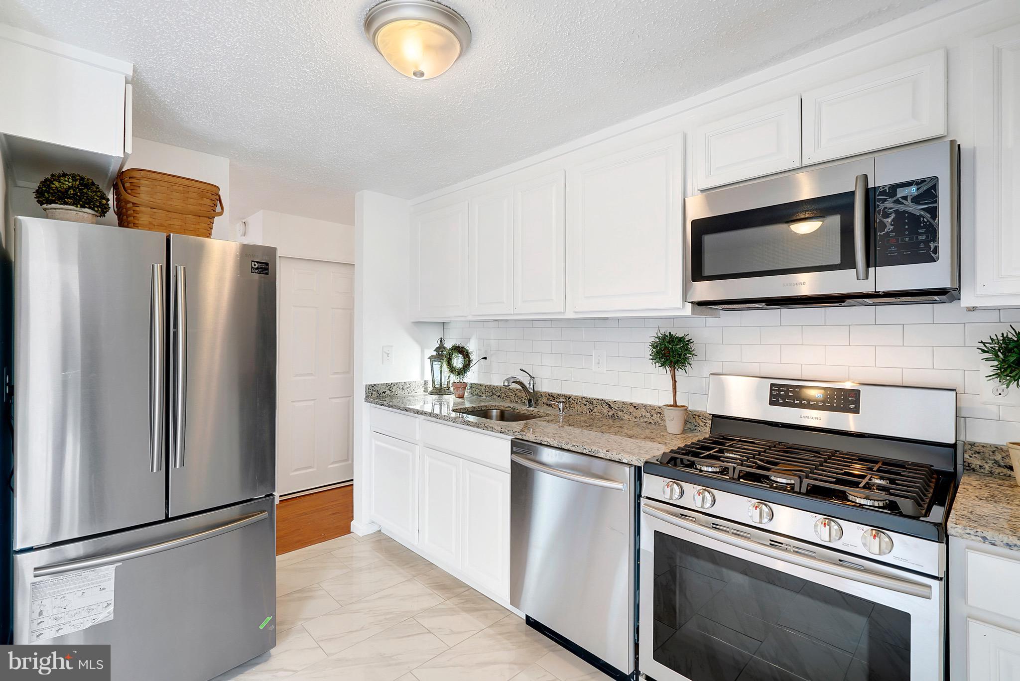 3200 Napper Road Alexandria, VA 22306 - Photo 11 of 37 Fresh Painted White Cabinets