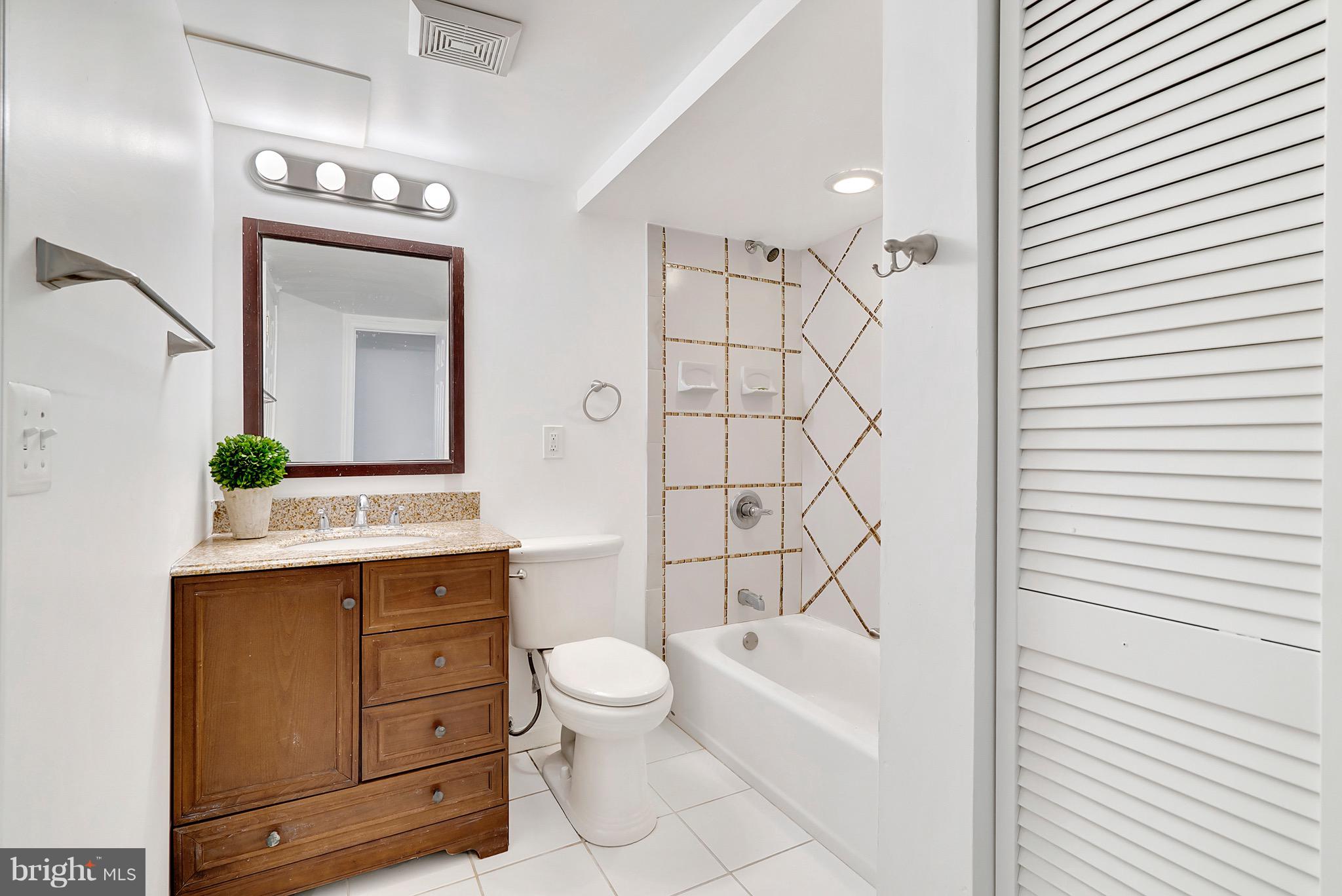 3200 Napper Road Alexandria, VA 22306 - Photo 29 of 37 Lower Level Full Bath with decorative tile