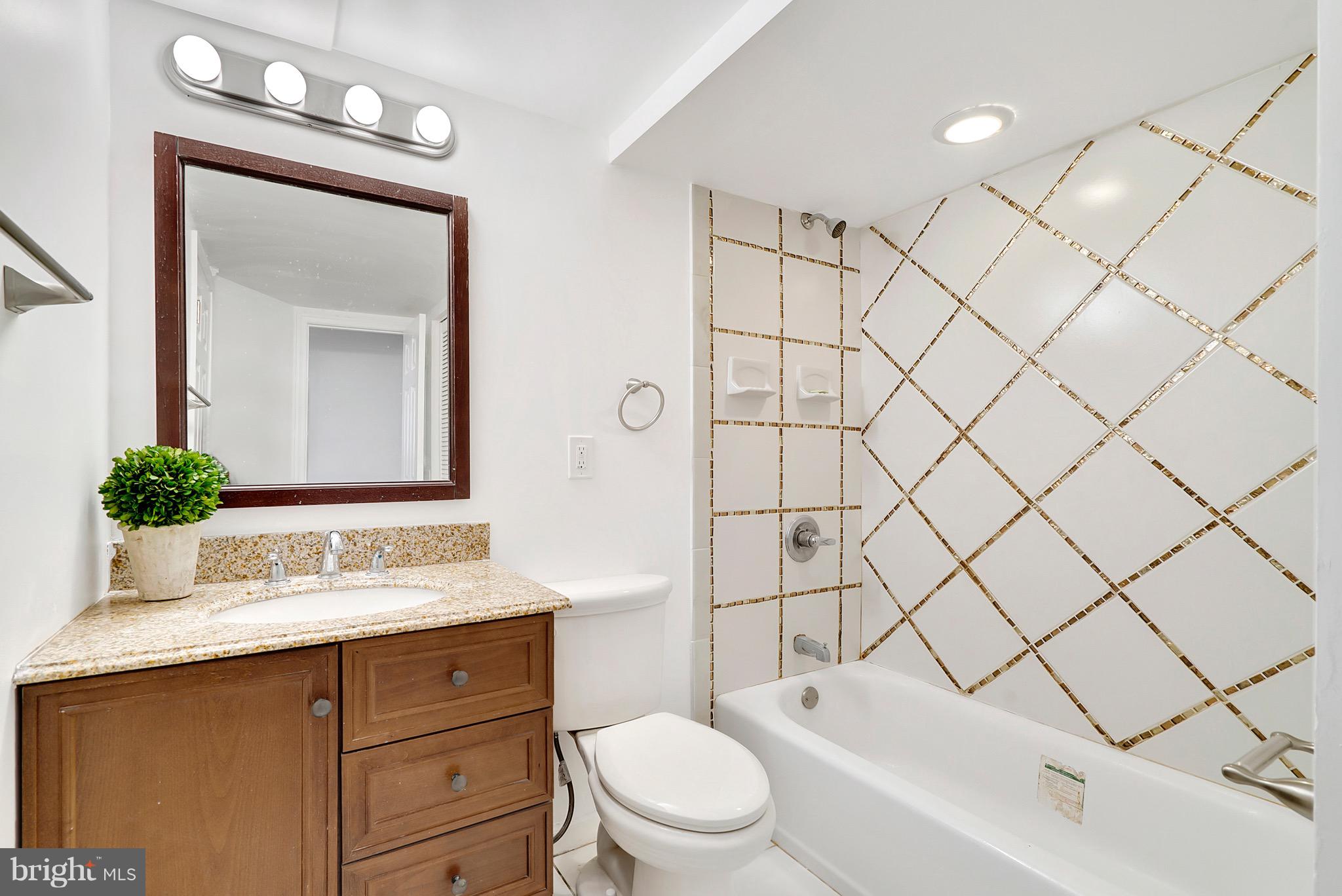 3200 Napper Road Alexandria, VA 22306 - Photo 30 of 37 Love the shower tile design