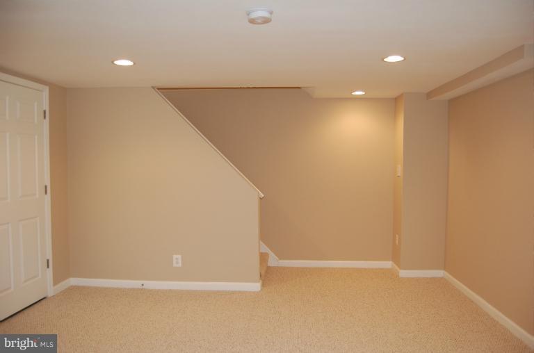 839 Reverdy Road Baltimore, MD 21212 - Photo 8 of 16 a view of an empty room