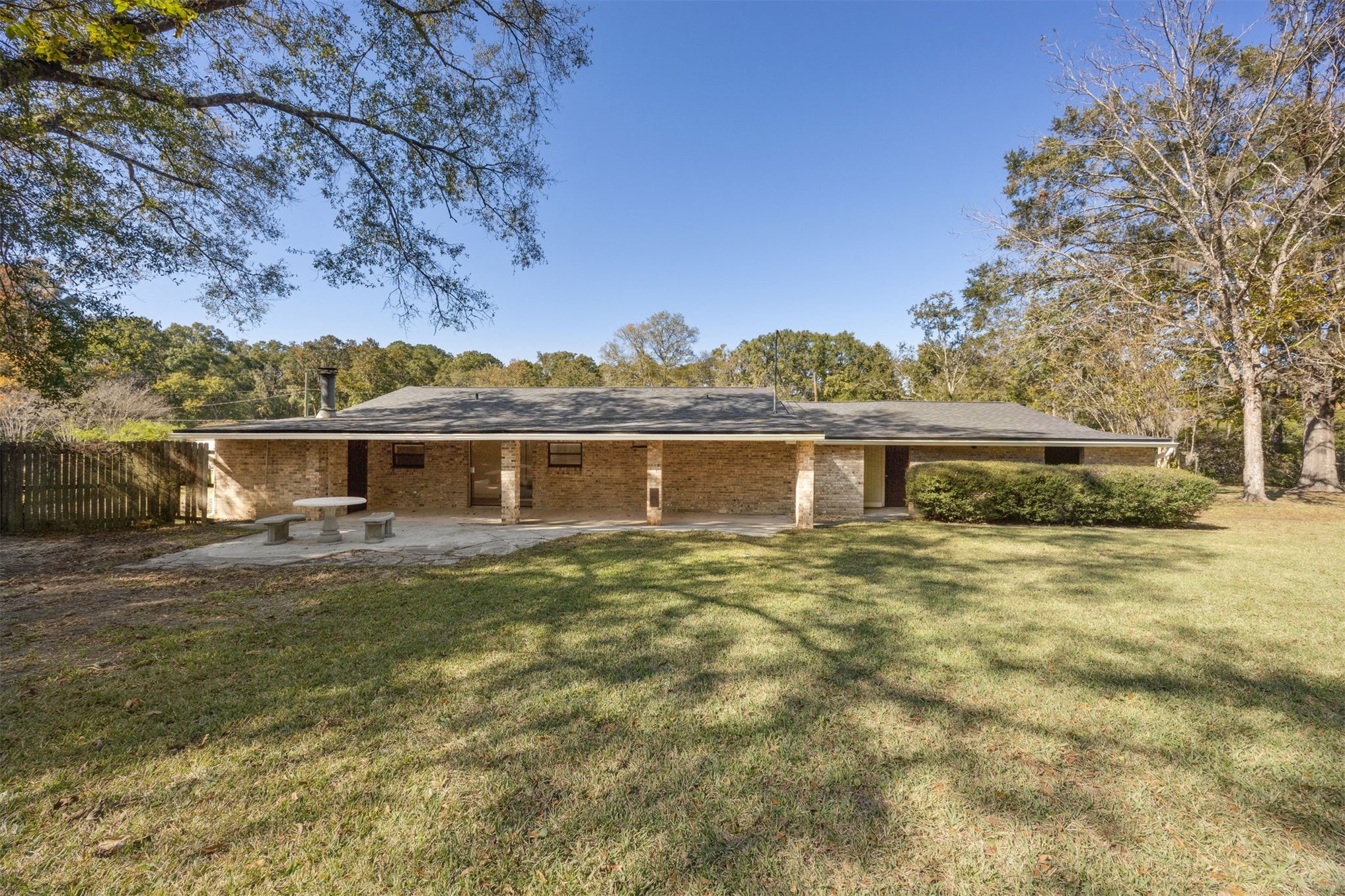44186 Lee Drive Callahan, FL 32011 - Photo 23 of 29 a front view of a house with a garden