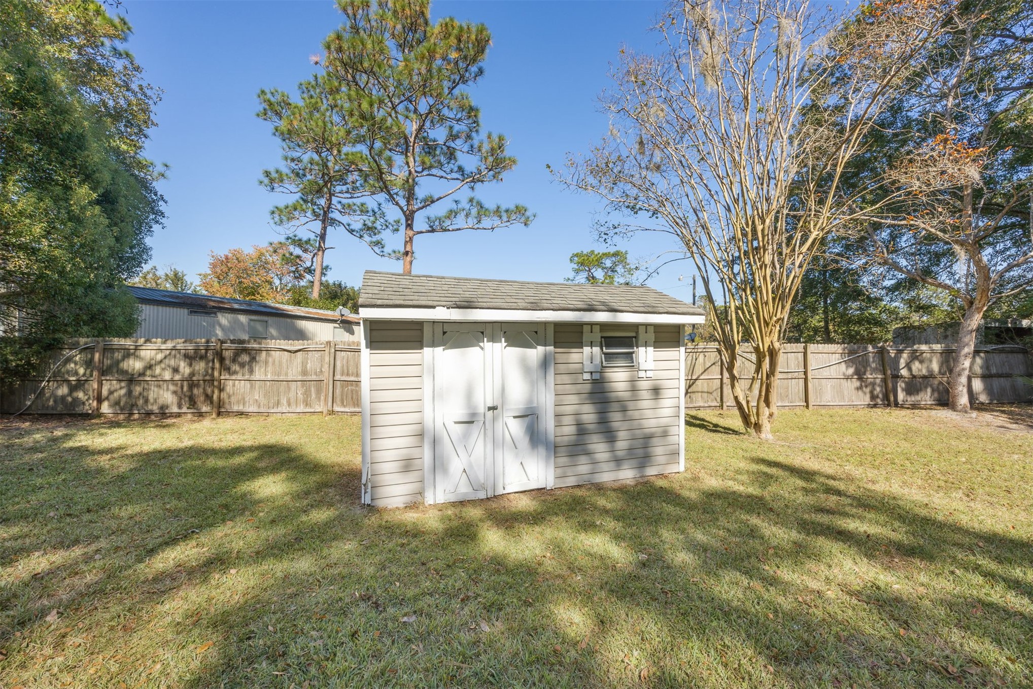 44186 Lee Drive Callahan, FL 32011 - Photo 26 of 29 a view of a yard with plants and trees
