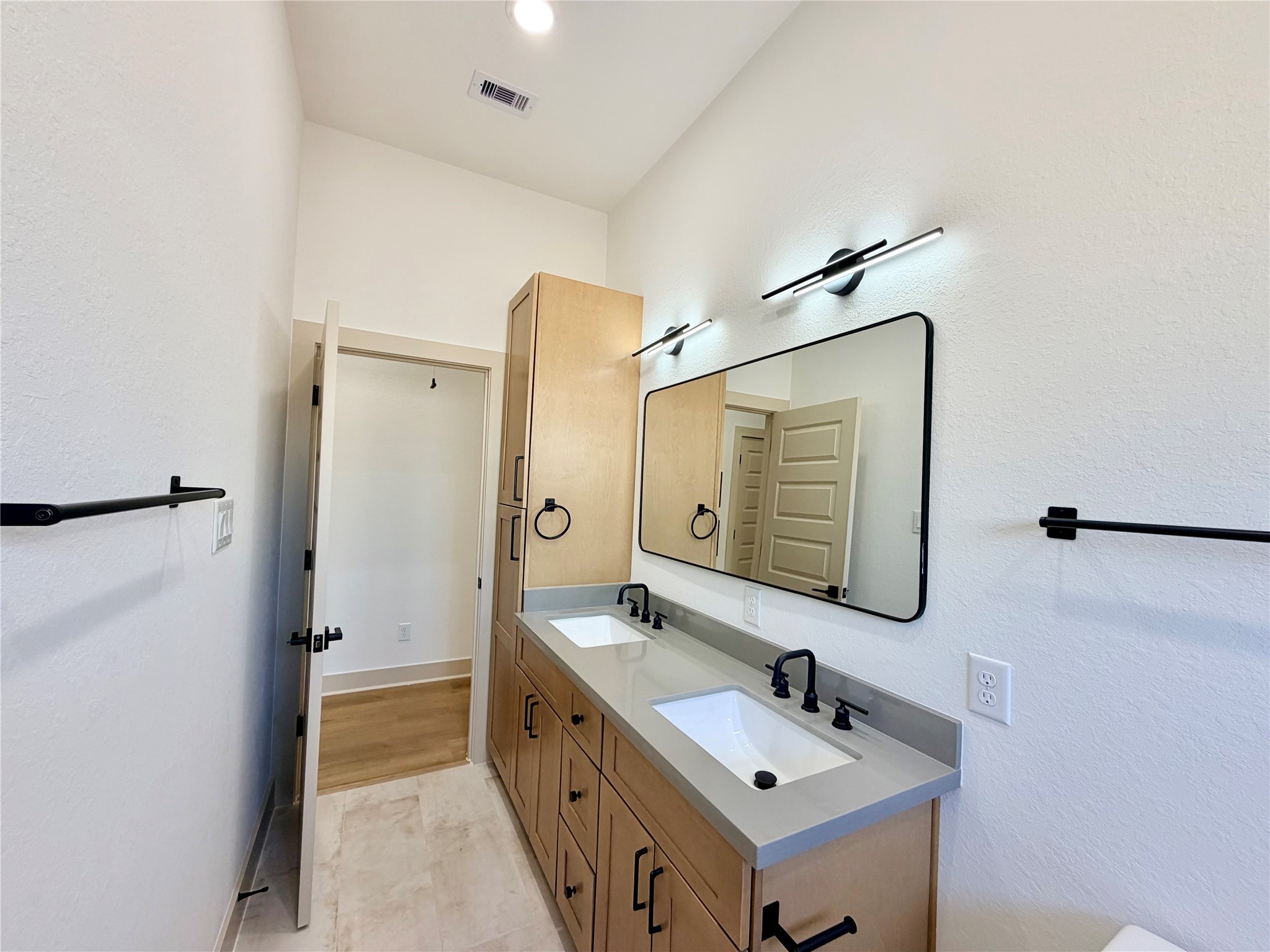 4214 Clover Street Houston, TX 77051 - Photo 16 of 34 a bathroom with a sink and a mirror