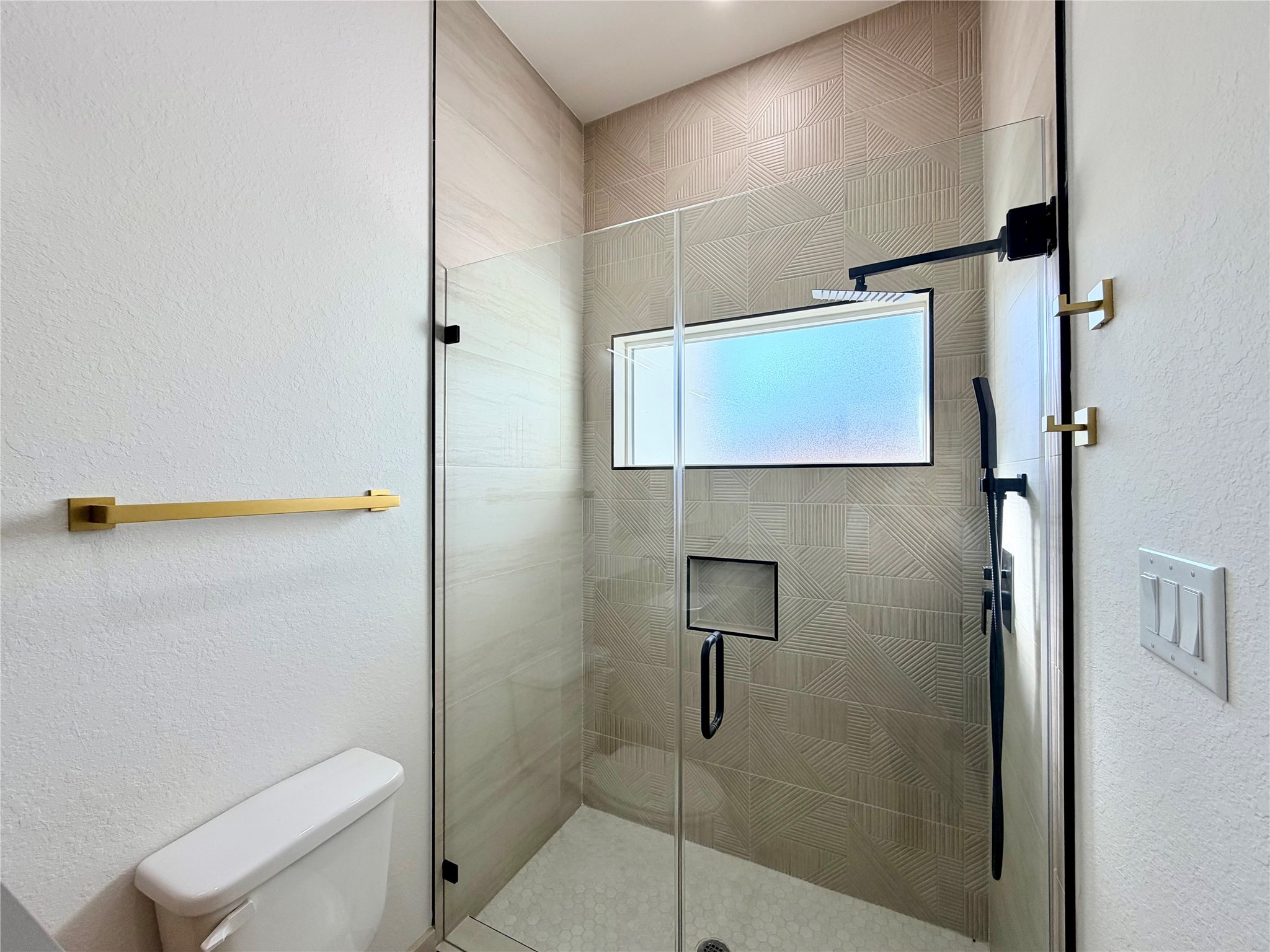 4214 Clover Street Houston, TX 77051 - Photo 29 of 34 a bathroom with a shower and toilet