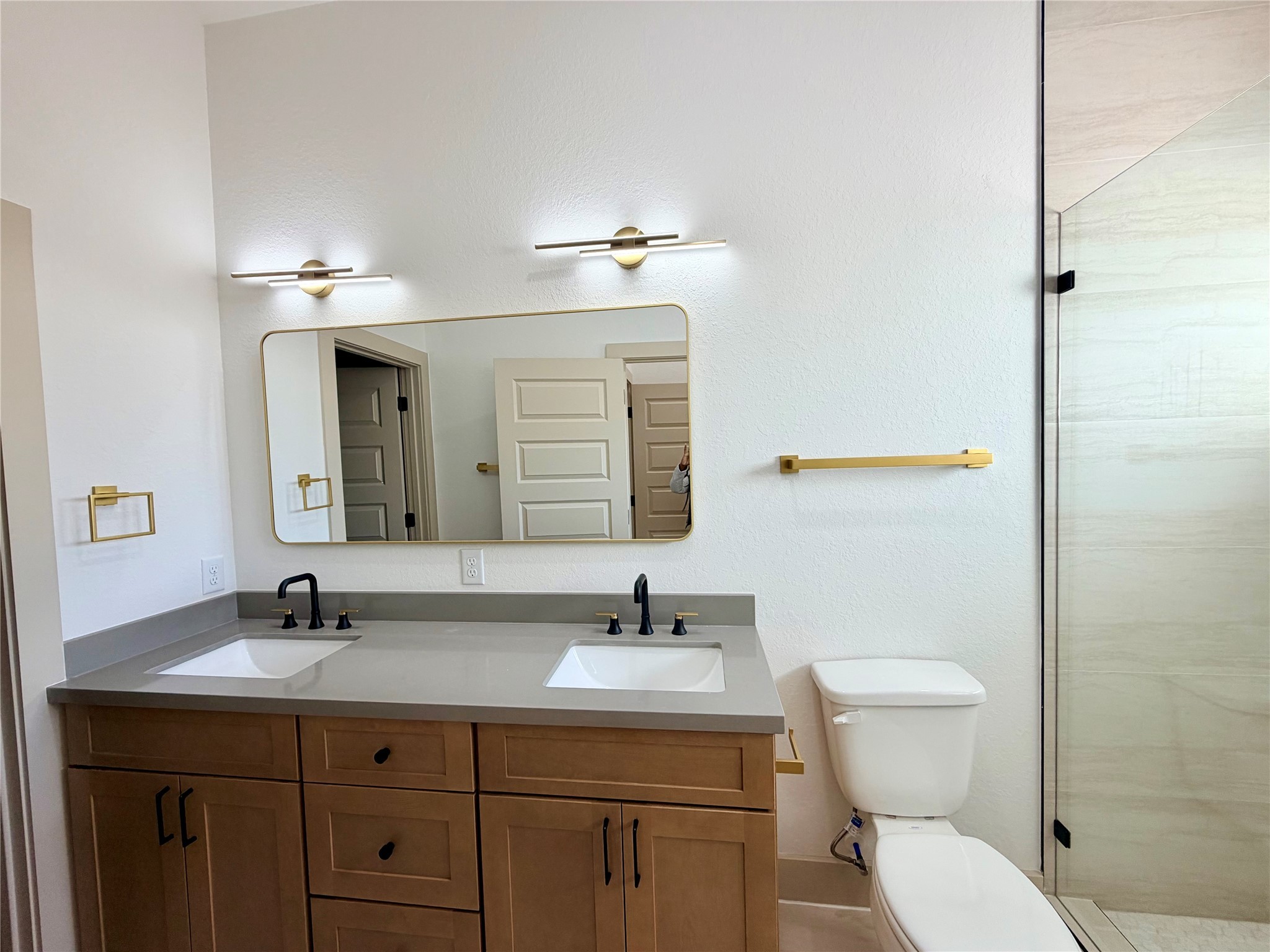 4214 Clover Street Houston, TX 77051 - Photo 31 of 34 a bathroom with a toilet a sink and mirror