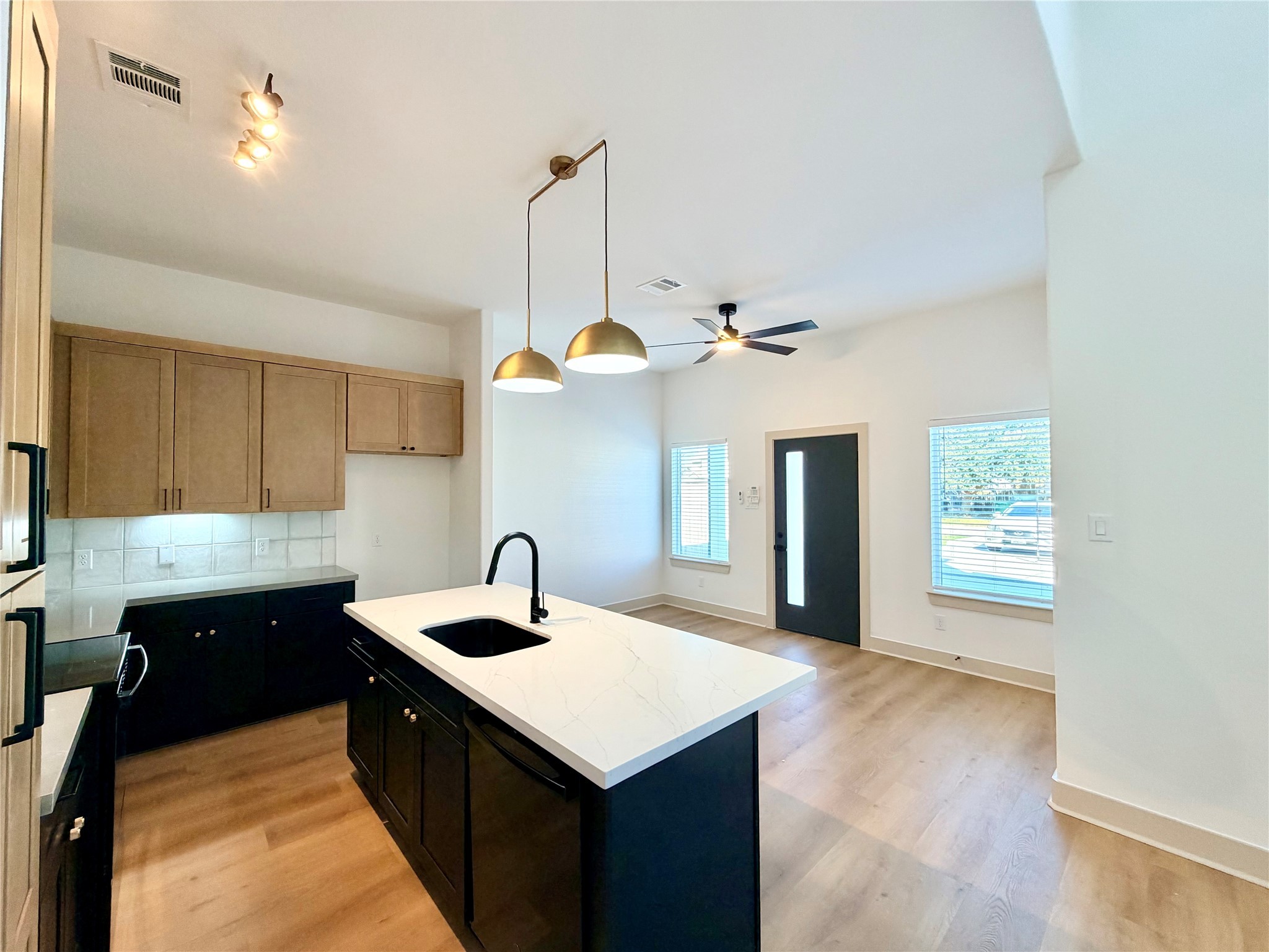 4214 Clover Street Houston, TX 77051 - Photo 5 of 34 a kitchen with a sink a counter space and a window