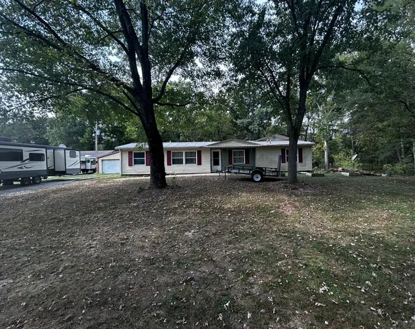 a view of house with outdoor space and street view