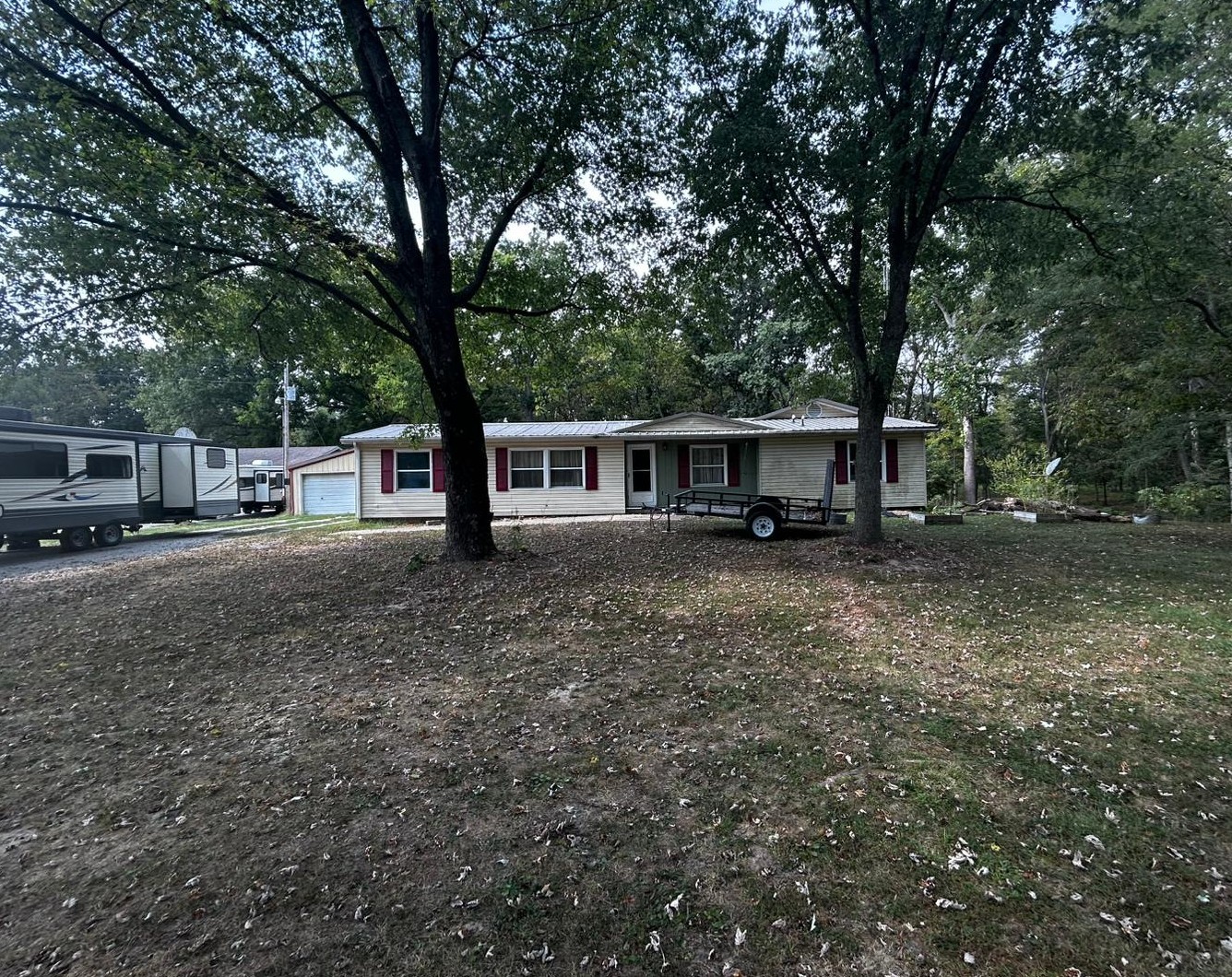a view of house with outdoor space and street view