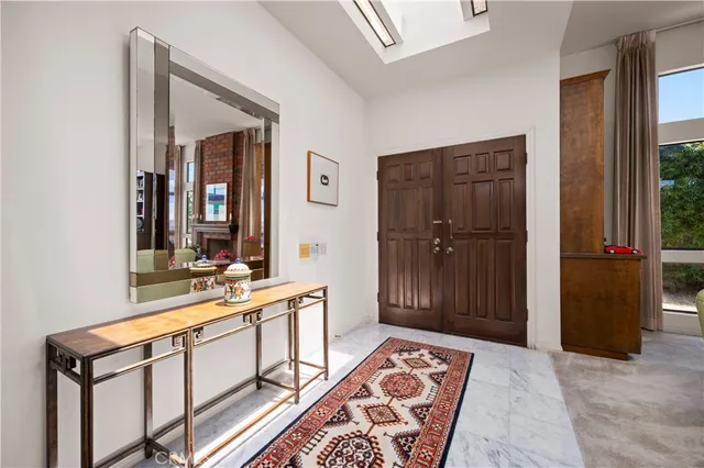 a kitchen with stainless steel appliances granite countertop a refrigerator and cabinets