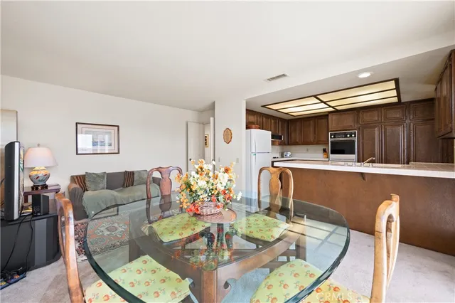 a bedroom with two beds and a window