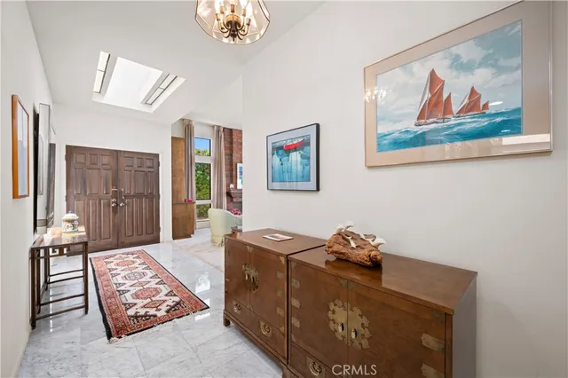 a bathroom with a sink a vanity and a mirror