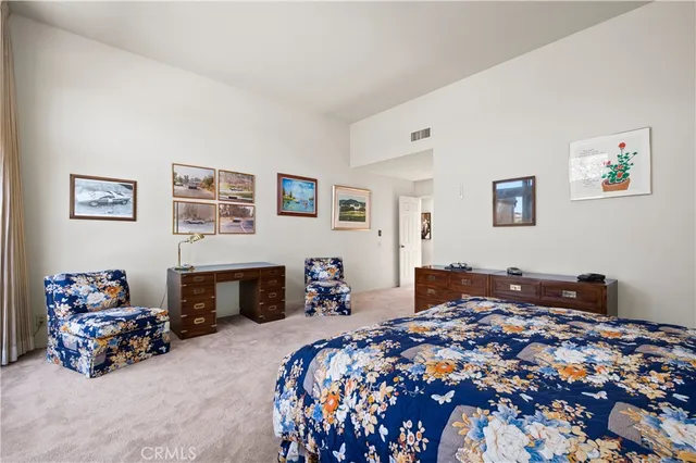 a view of a swimming pool with a yard