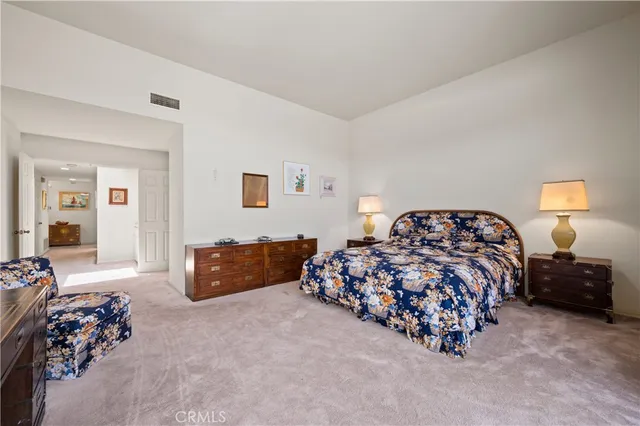 an aerial view of a house with a ocean view