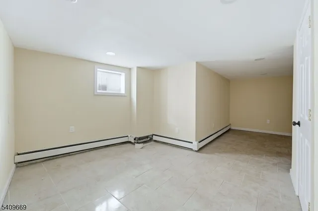 a view of a room with drop ceiling