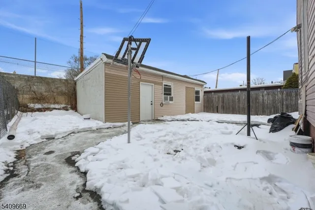 a view of a backyard of a house
