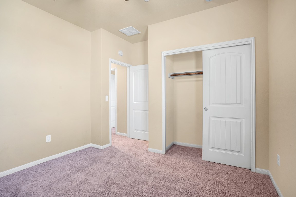 2880 Donnell Drive, Unit 2003 Round Rock, TX 78664 - Photo 16 of 27 a view of an empty room with closet area