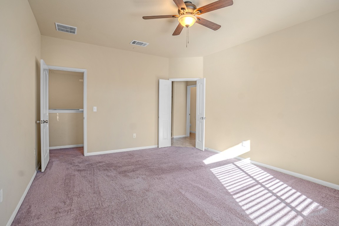 2880 Donnell Drive, Unit 2003 Round Rock, TX 78664 - Photo 19 of 27 a view of a room with a ceiling fan