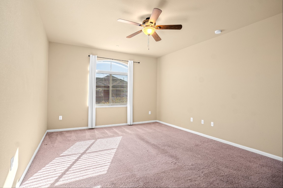 2880 Donnell Drive, Unit 2003 Round Rock, TX 78664 - Photo 21 of 27 a view of an empty room with a window