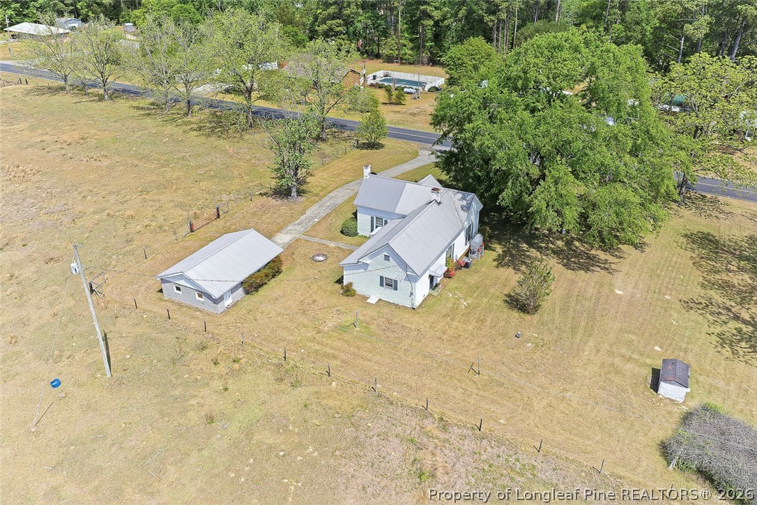249 Nicholson Road Rockingham, NC 28379 - Photo 42 of 47 an aerial view of residential houses with outdoor space
