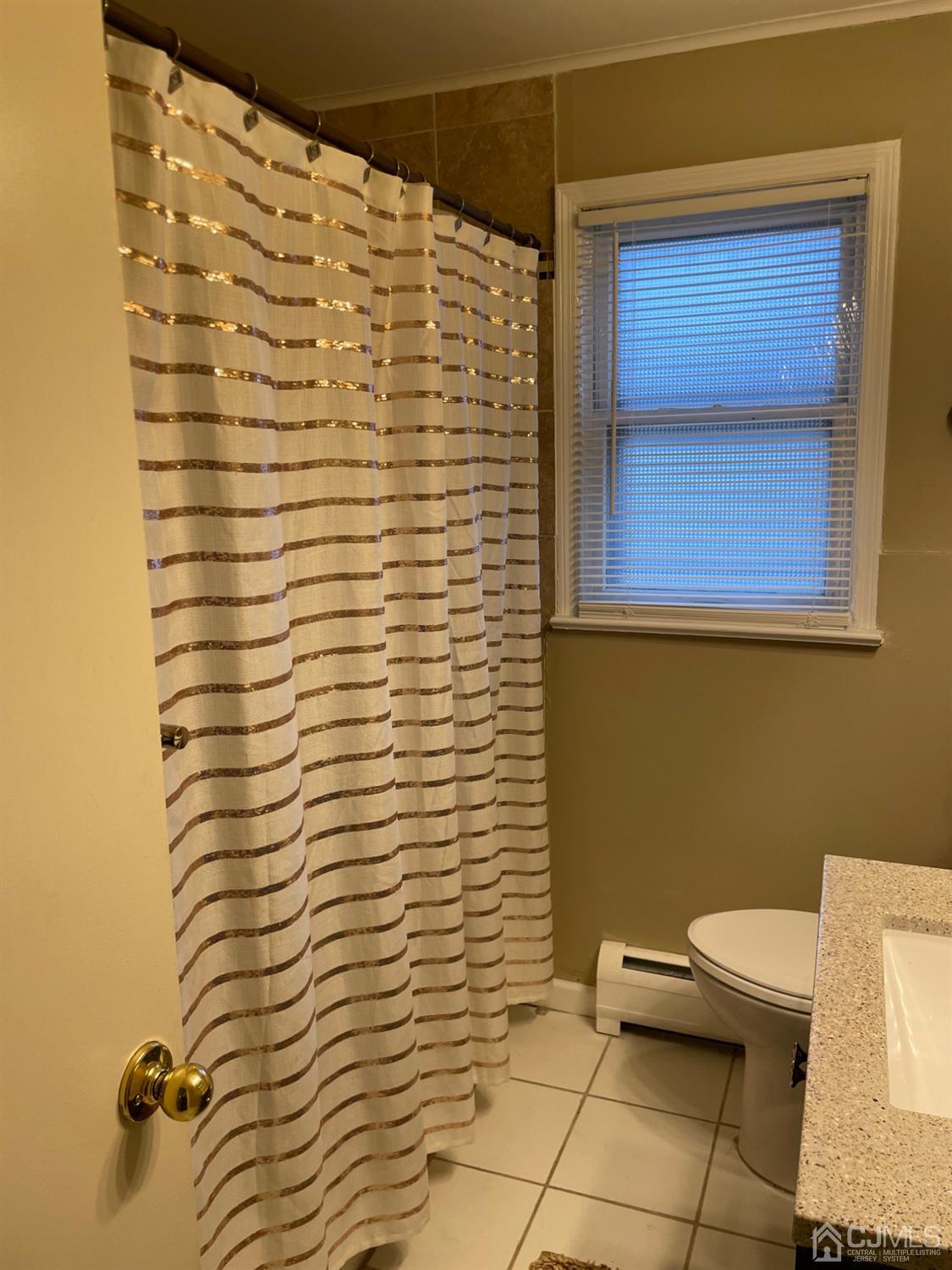94 South Hill Road Colonia, NJ 07067 - Photo 12 of 15 a bathroom with a shower