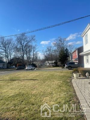94 South Hill Road Colonia, NJ 07067 - Photo 15 of 15 a swimming pool with outdoor seating and yard