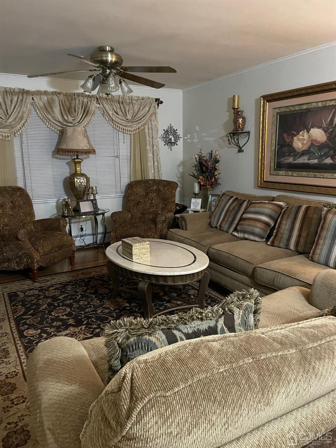 94 South Hill Road Colonia, NJ 07067 - Photo 5 of 15 a living room with furniture and a table