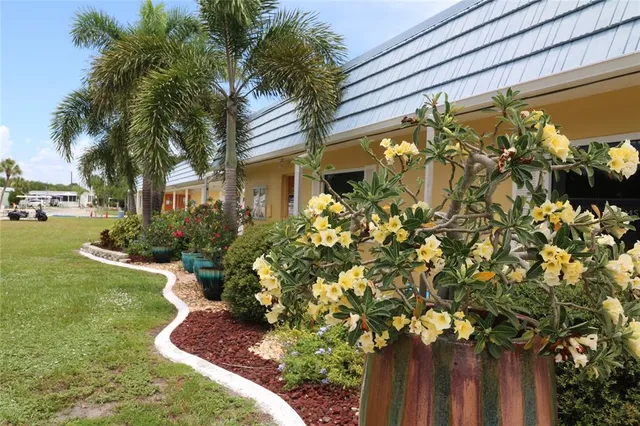 a view of a lake with outdoor seating