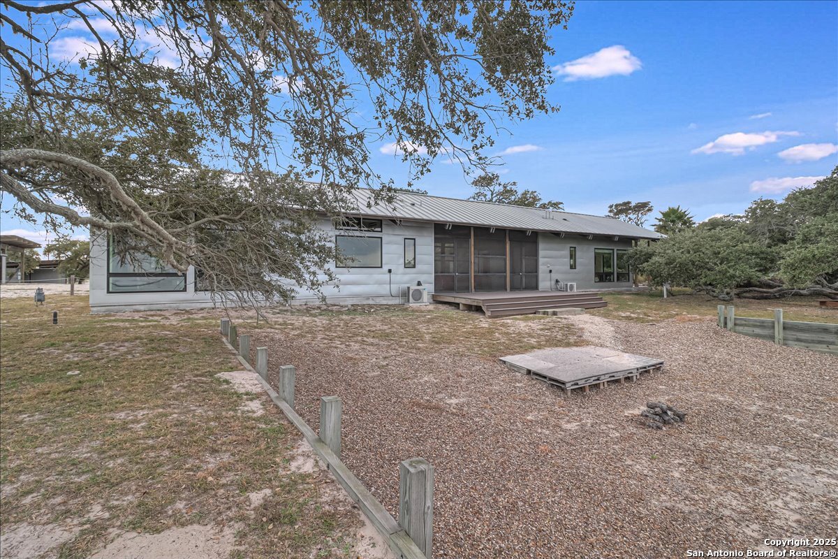 6031 Loop 1781 Rockport, TX 78382 - Photo 19 of 42 a view of a house with backyard
