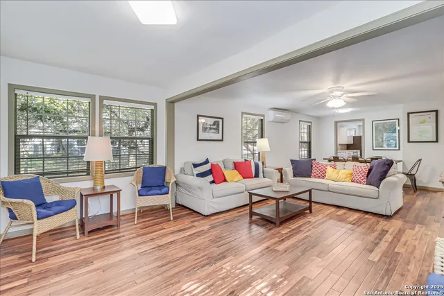 a bedroom with a bed and chair