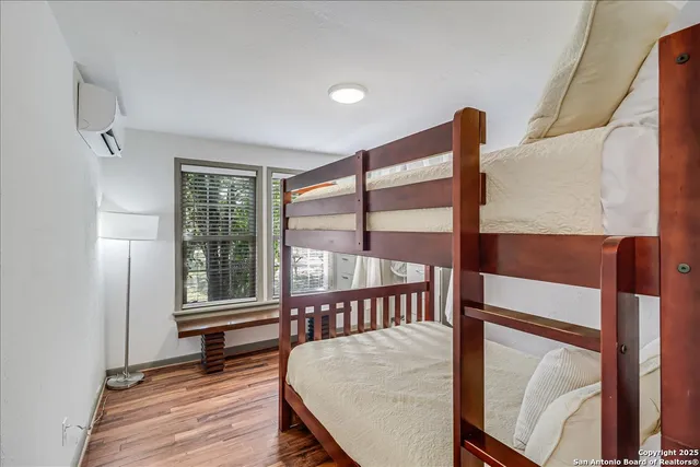 a bathroom with a sink a washer and dryer