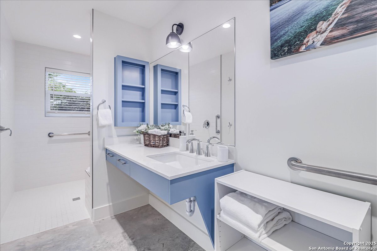 6031 Loop 1781 Rockport, TX 78382 - Photo 42 of 42 a bathroom with a sink a toilet and shower