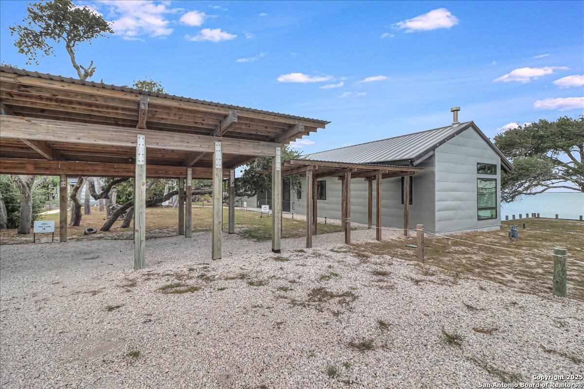 6031 Loop 1781 Rockport, TX 78382 - Photo 6 of 42 a view of a house with a backyard
