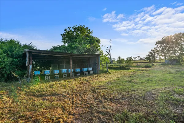 a view of a house with a big yard