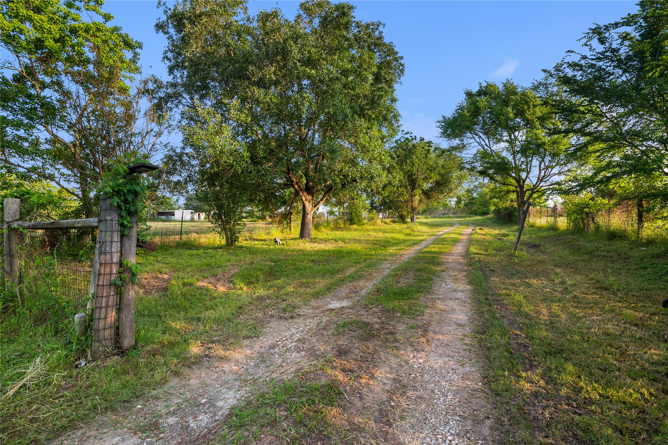 36622 Tompkins Road Hempstead, TX 77445 - Photo 3 of 46 a view of a golf course with a yard