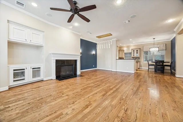 a view of a kitchen with a stove cabinets and wooden floor