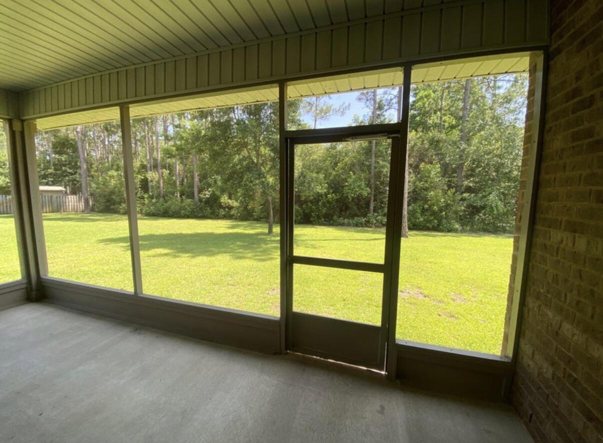 40 Woodwind Way Freeport, FL 32439 - Photo 6 of 14 Screened Florida Room